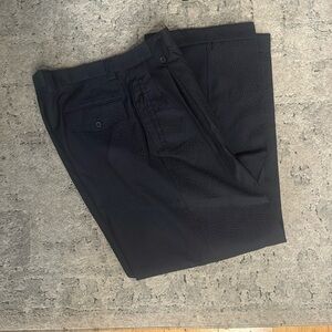 This are a pair of Tiglio Luxe dress pants.